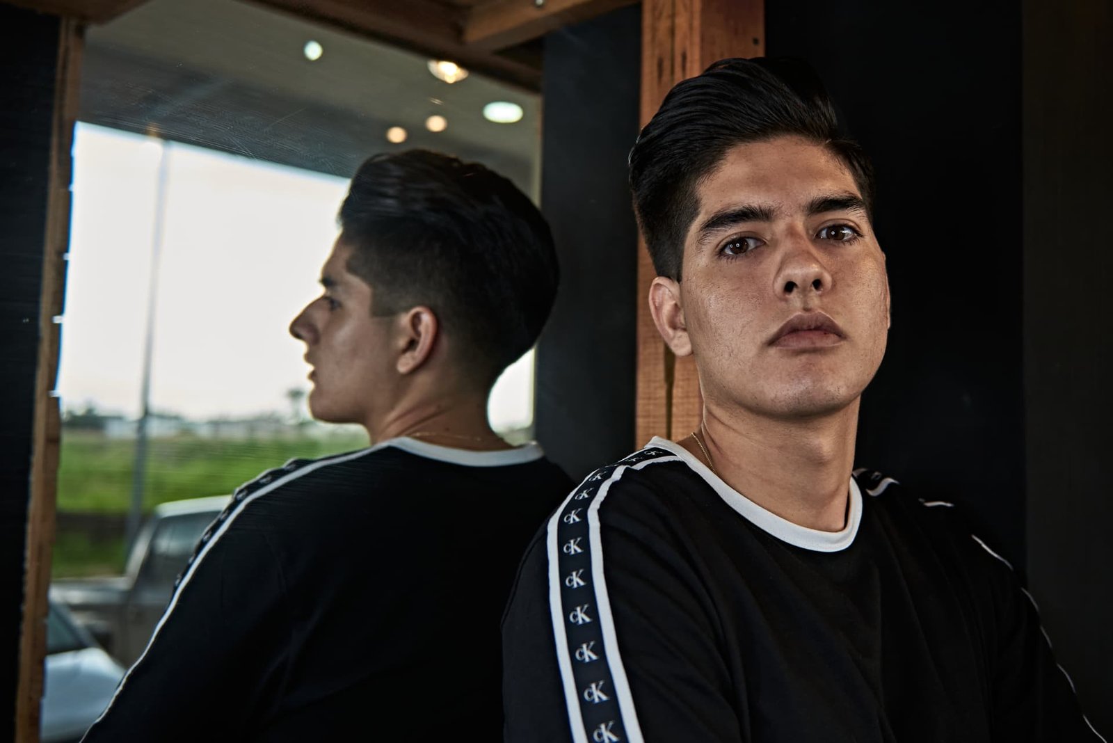 Miguel Ángel, fundador de U Delivery Barber, con corte ejecutivo